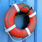 life preserver hanging on wall